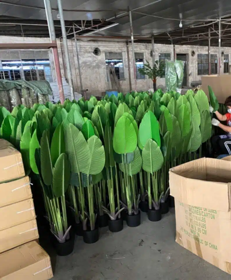Multiple artificial plants in factory assembly line