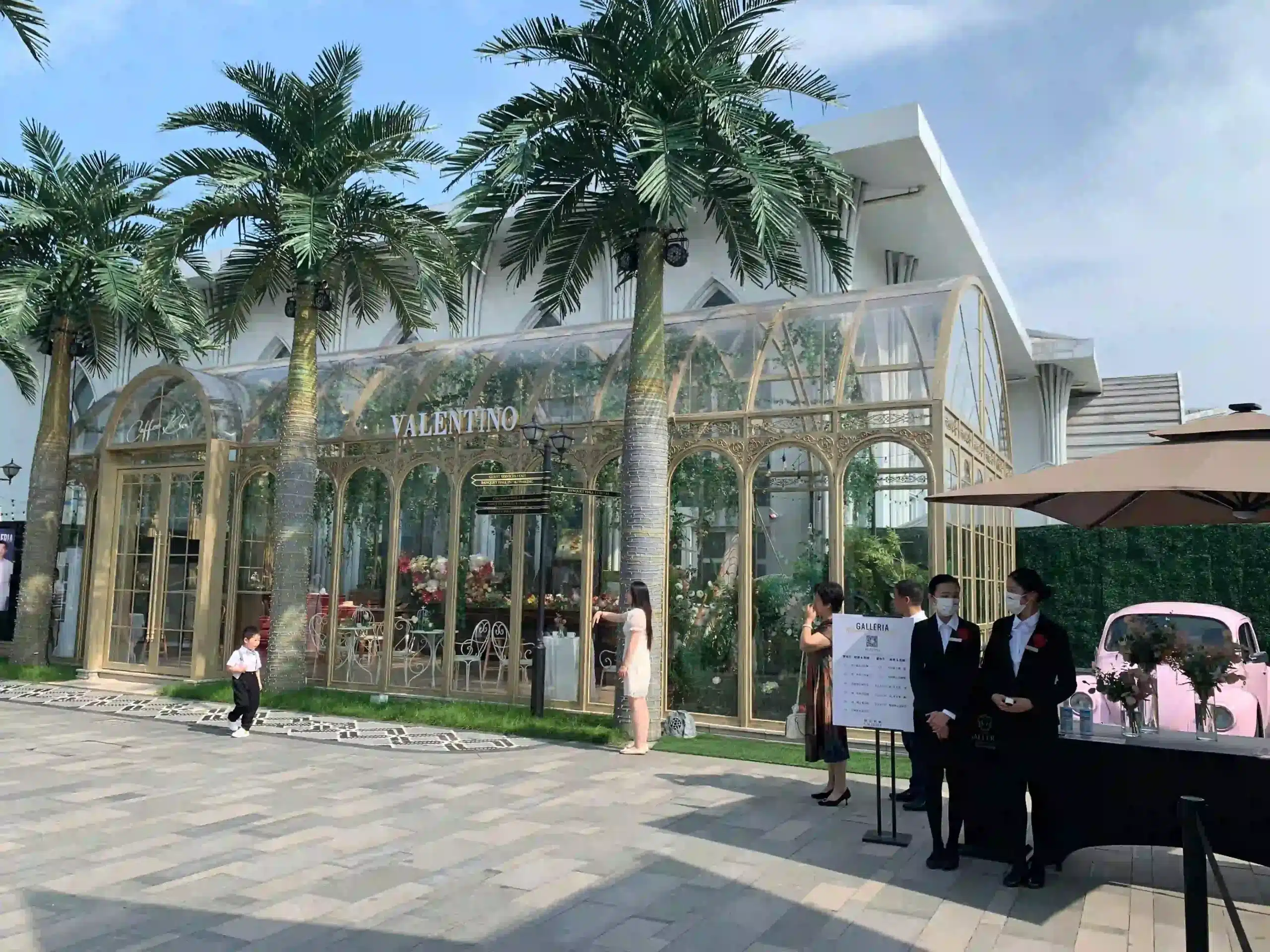 Tall artificial coconut palm trees used for resort and outdoor commercial landscaping